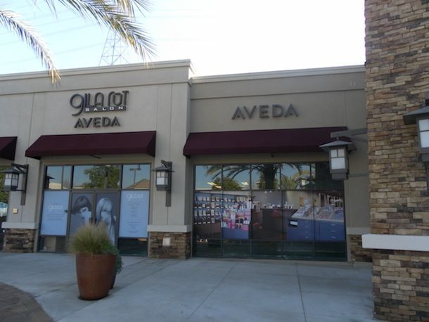 A building with a sign that says aveda on it