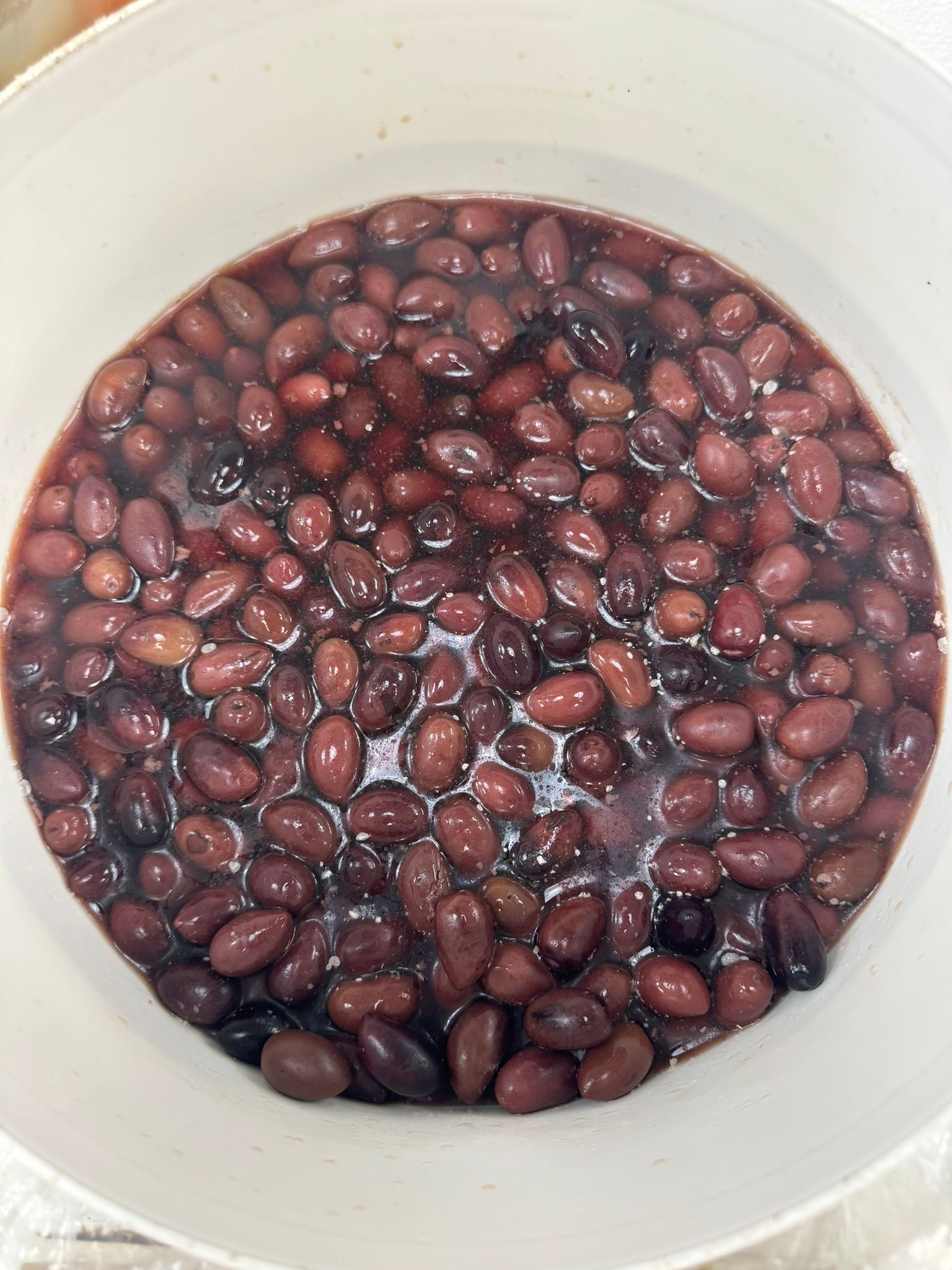 Bowl of soaked red beans in water