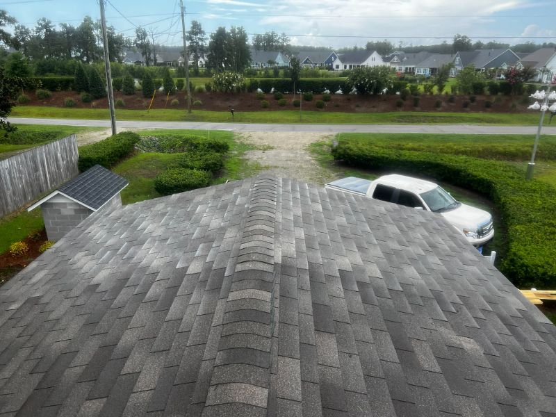 A car is parked on the roof of a house.