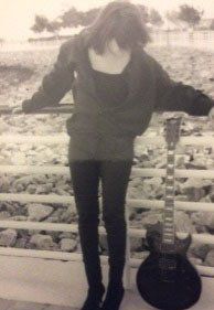 The wild child with her signature guitar