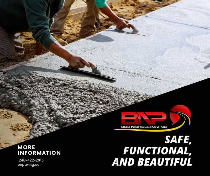 Construction workers smooth wet concrete into a sidewalk, with the Bob Nichols Paving logo and slogan overlaid below.