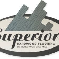 The logo for superior hardwood flooring by herwynen saw mill.