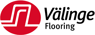 A red and white logo for a company called vallinge flooring