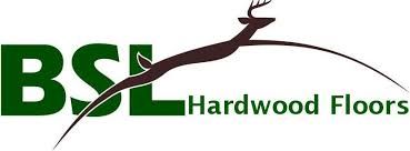 The logo for bsl hardwood floors has a deer on it.