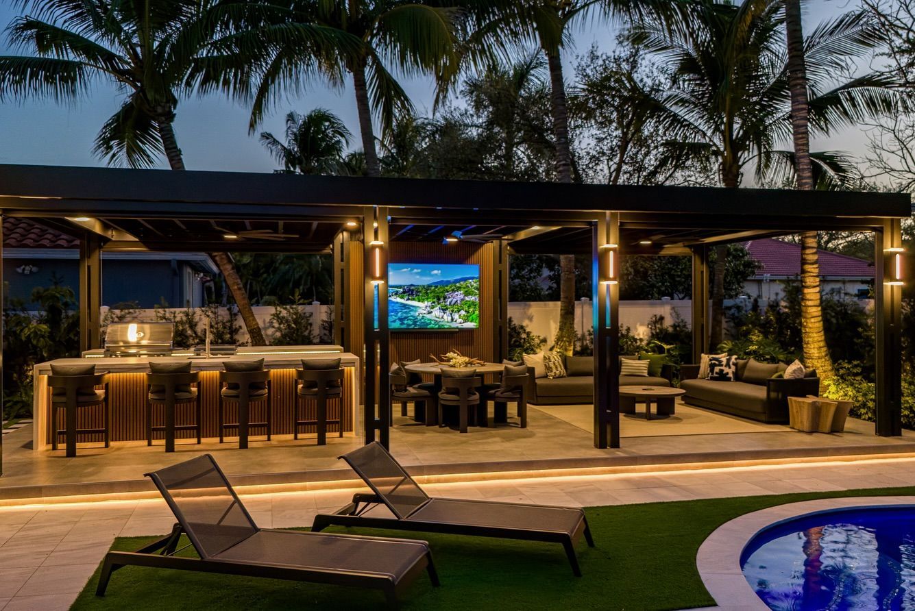 There is a swimming pool in the backyard of a house.