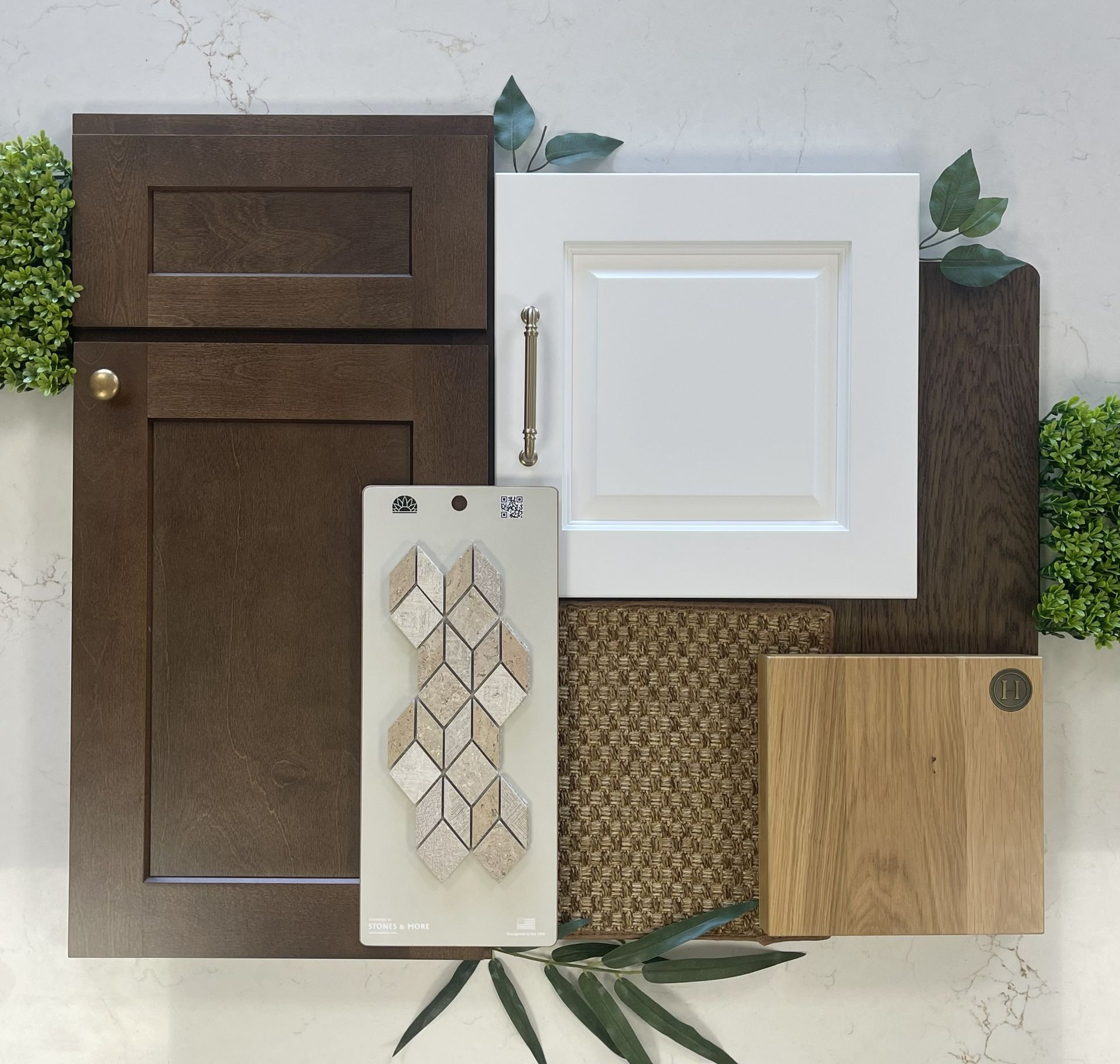 A design sample board featuring dark brown and white cabinet doors, a light oak wood swatch, and diamond-patterned tile.