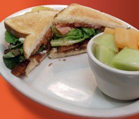 Clubhouse sandwiches with fruits