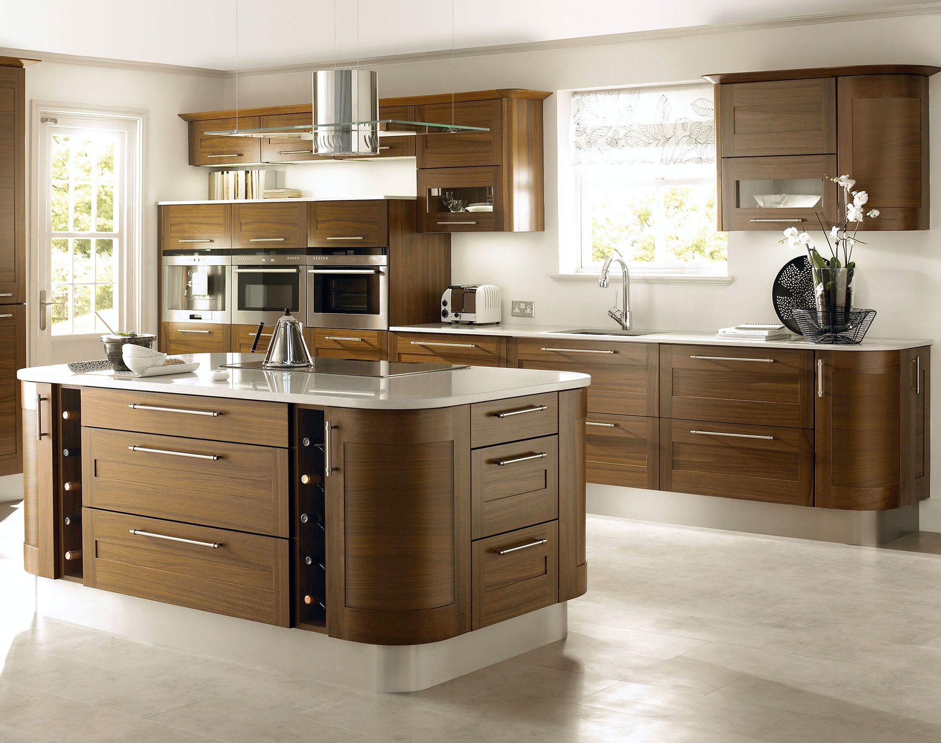 A kitchen with a large island in the middle