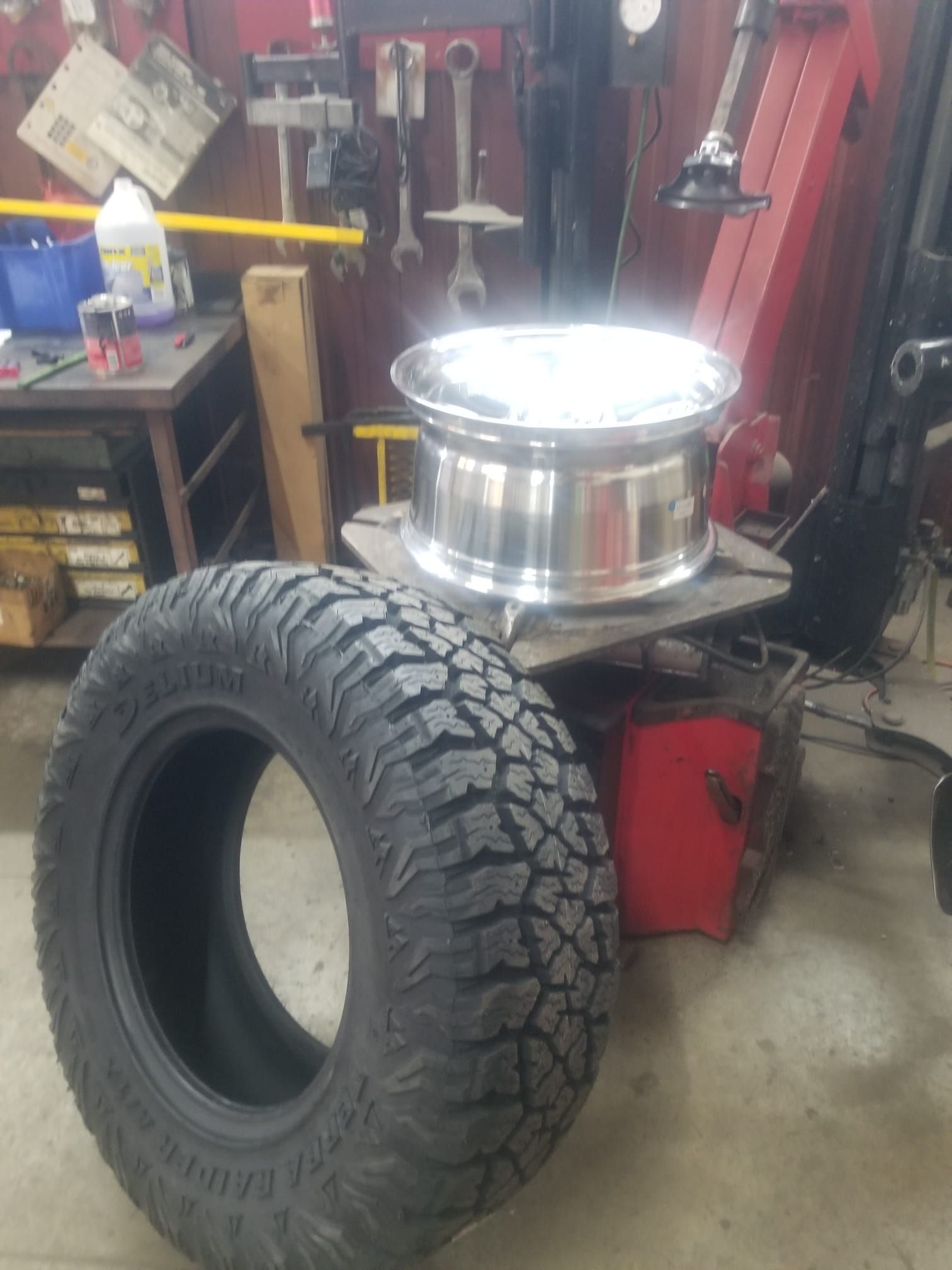 A tire sitting on top of a tire changer