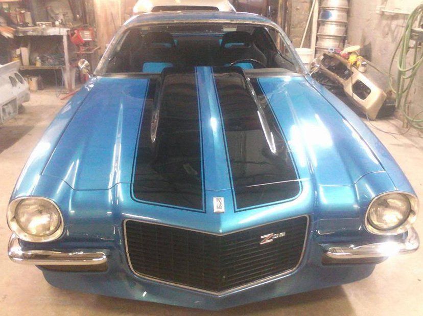 Newly painted blue car