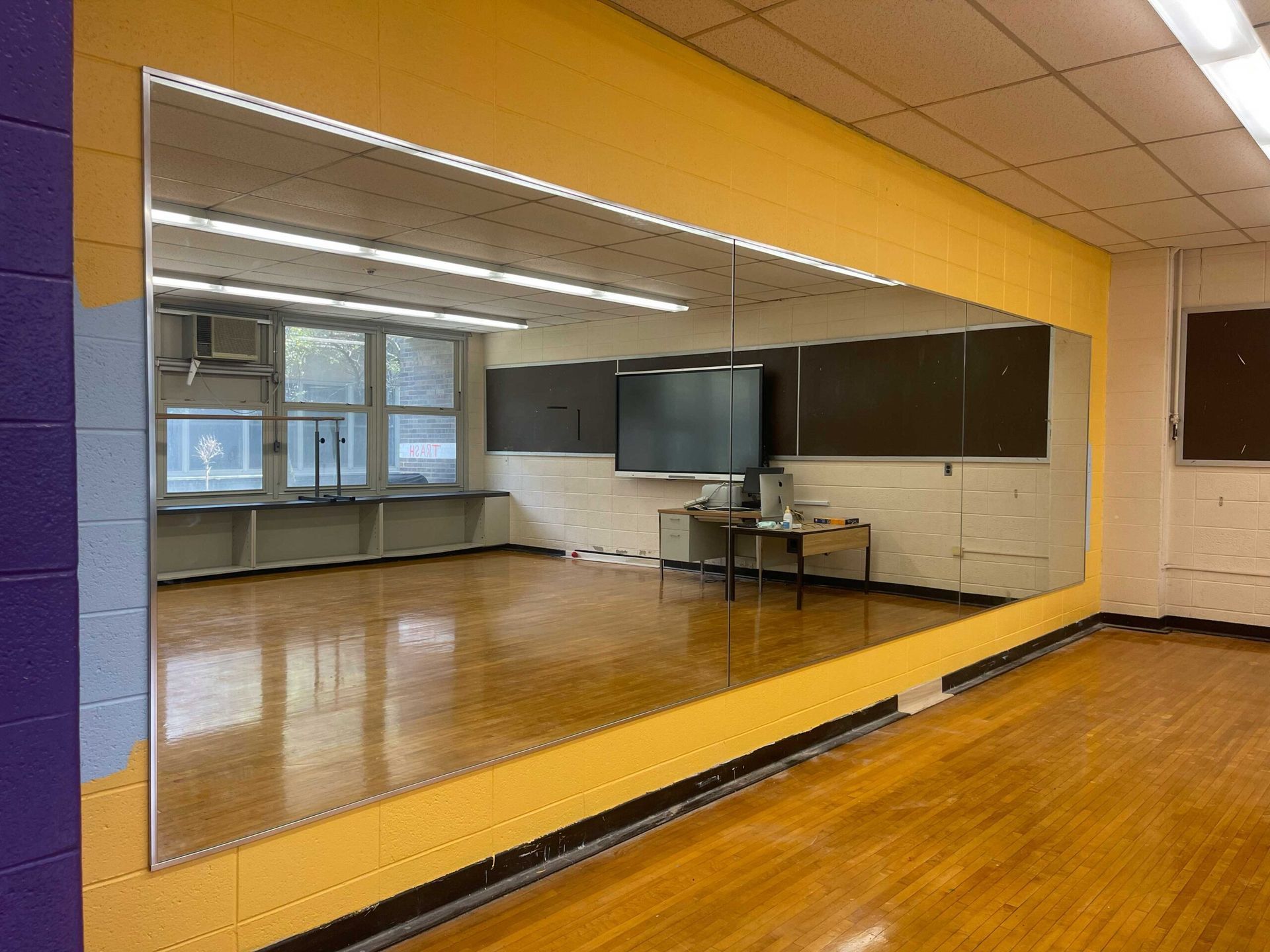 There is a large mirror in the middle of the room.