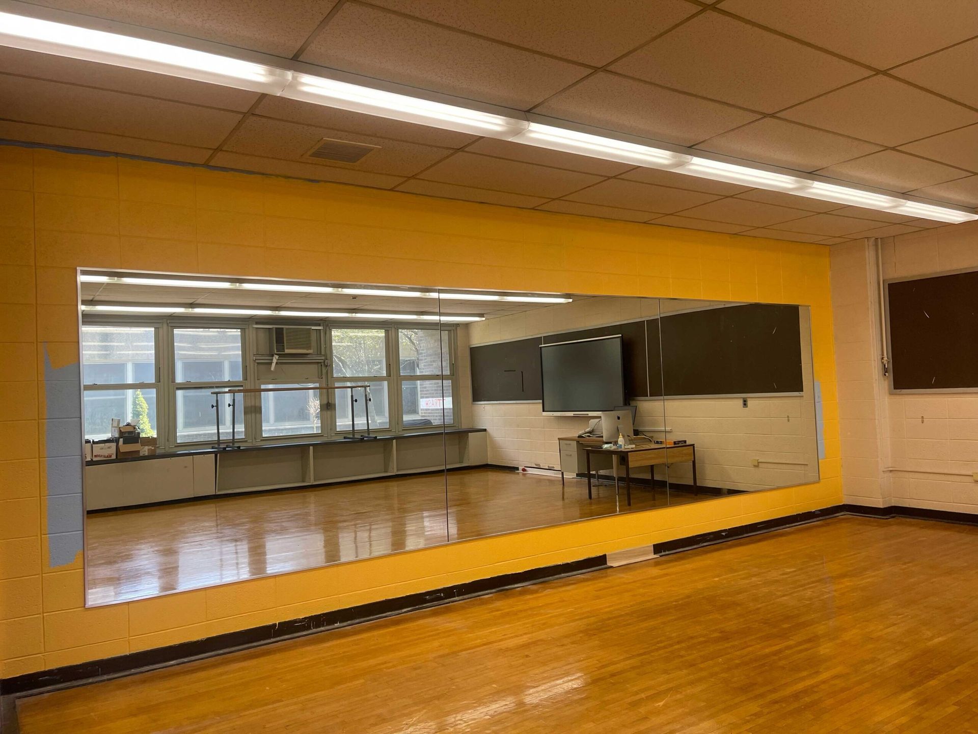 There is a large mirror in the middle of the room.