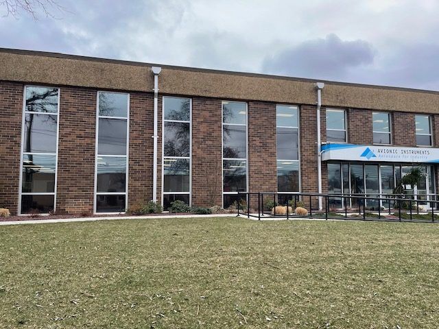 A large brick building with a lot of windows