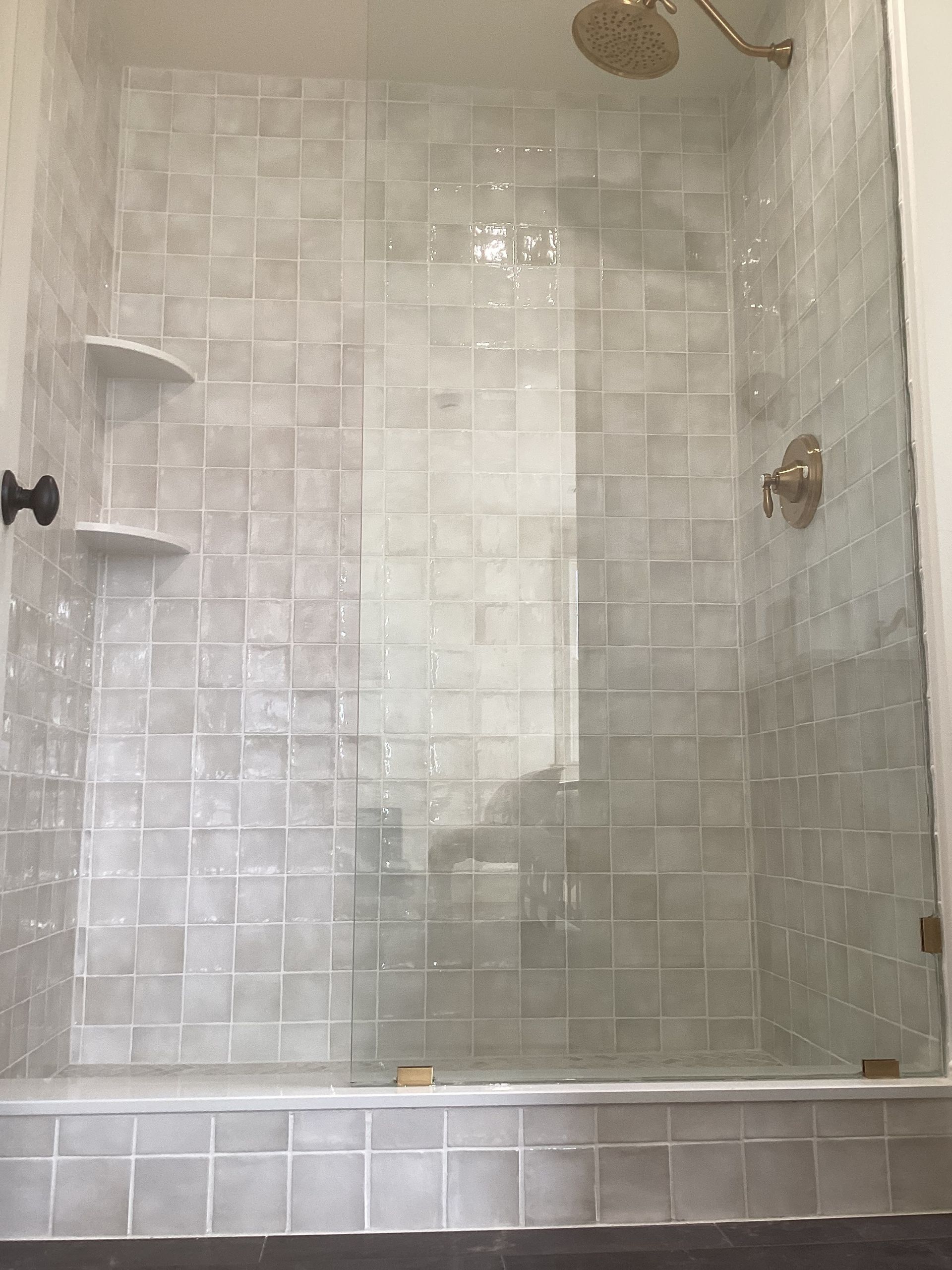 A kitchen with a stove top oven and a coffee maker.