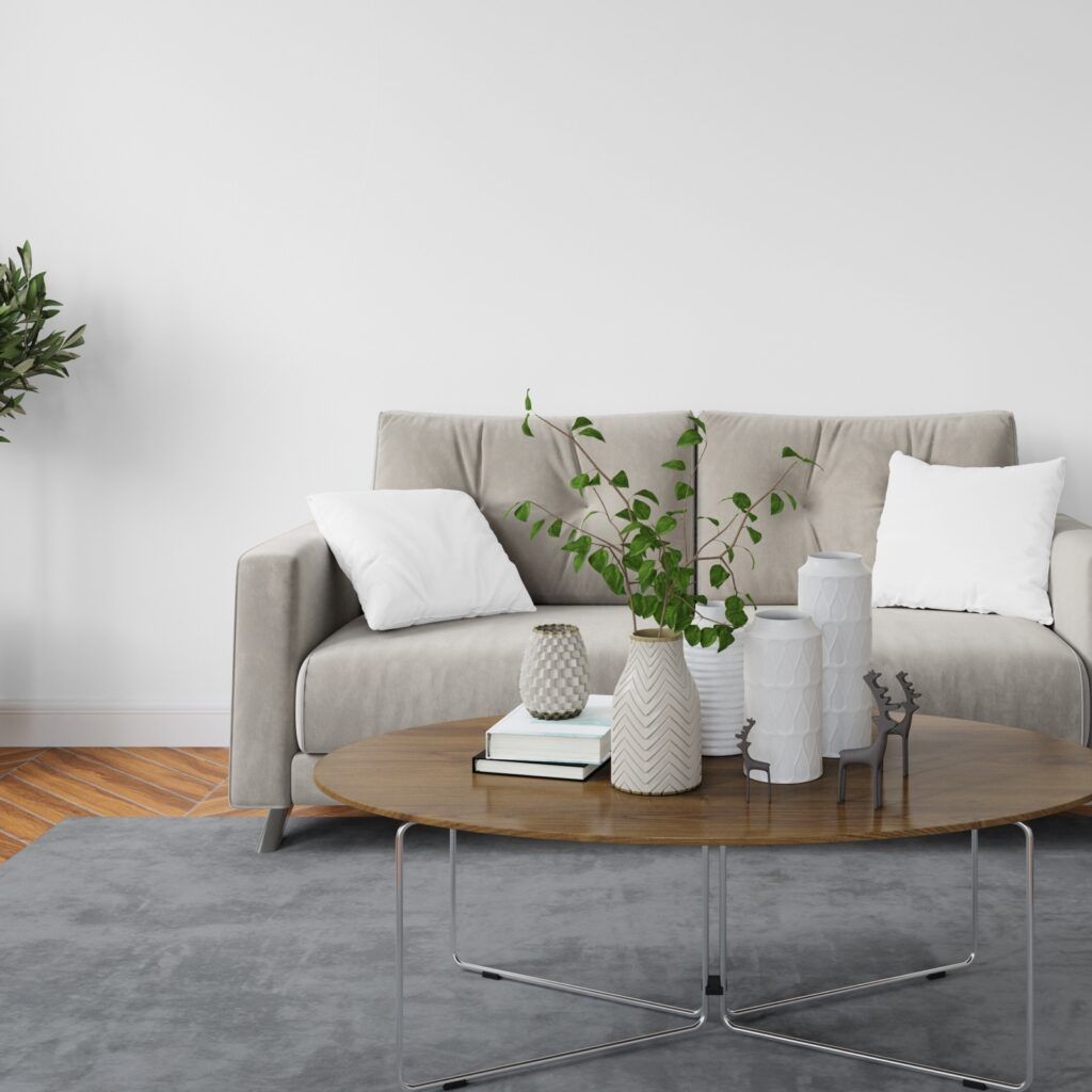 A living room with a couch and a coffee table