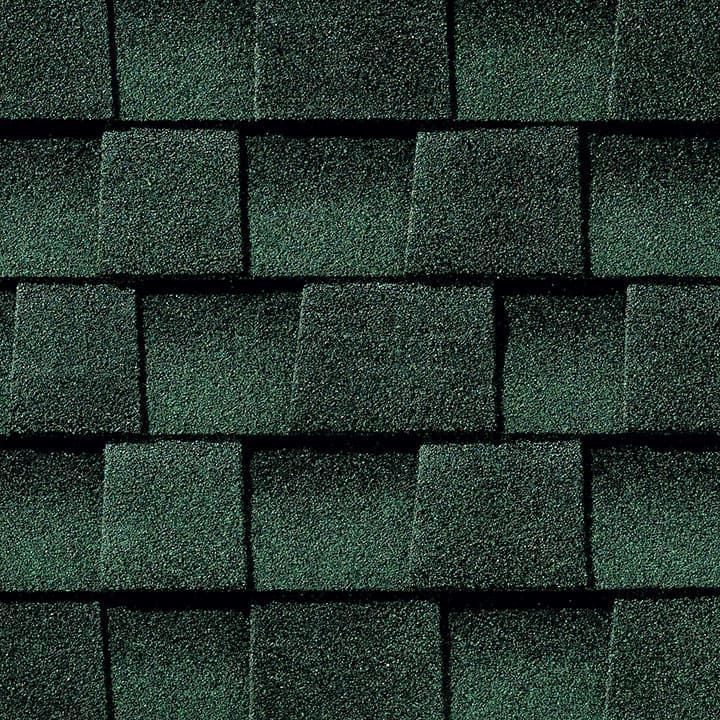 Green asphalt roof shingles.
