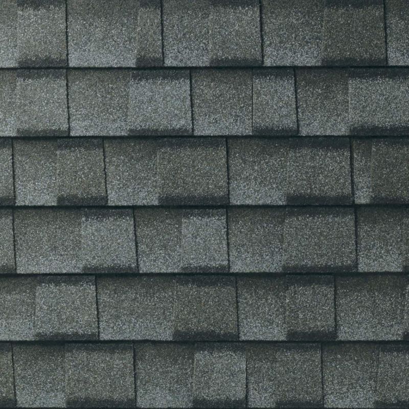 Gray asphalt roof shingles.