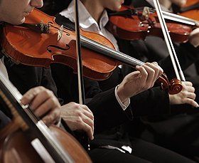 Closeup of violinists