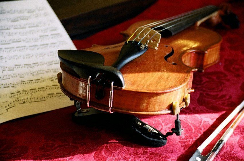 Closeup of violin and sheet music