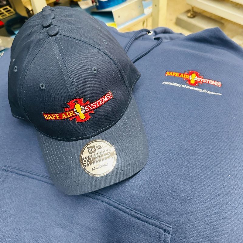 A baseball cap that says safe air systems on it