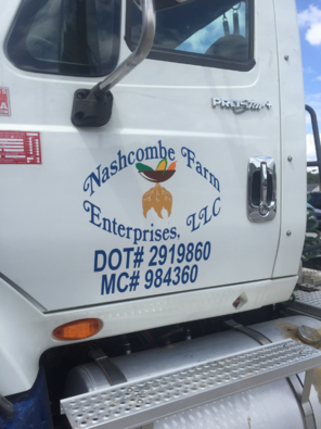 White truck door with Nashcombe Farm Enterprises, LLC logo and DOT/MC numbers