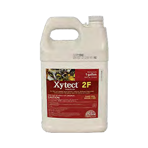 A gallon of xyltec 2f insecticide on a white background.