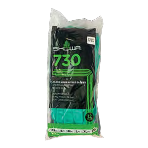 A bag of black and green gloves on a white background.