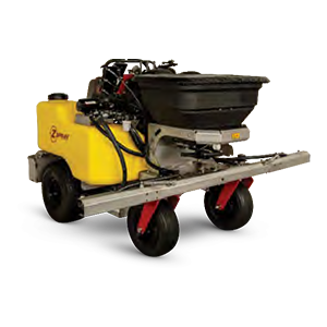 A yellow and black lawn mower with a spreader attached to it.