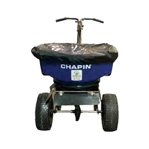 A chapin spreader is sitting on a white surface.