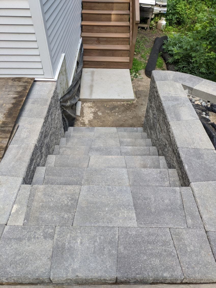 A set of stairs leading up to a house.