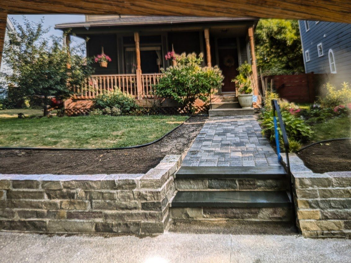 A picture of a house with stairs leading up to it.