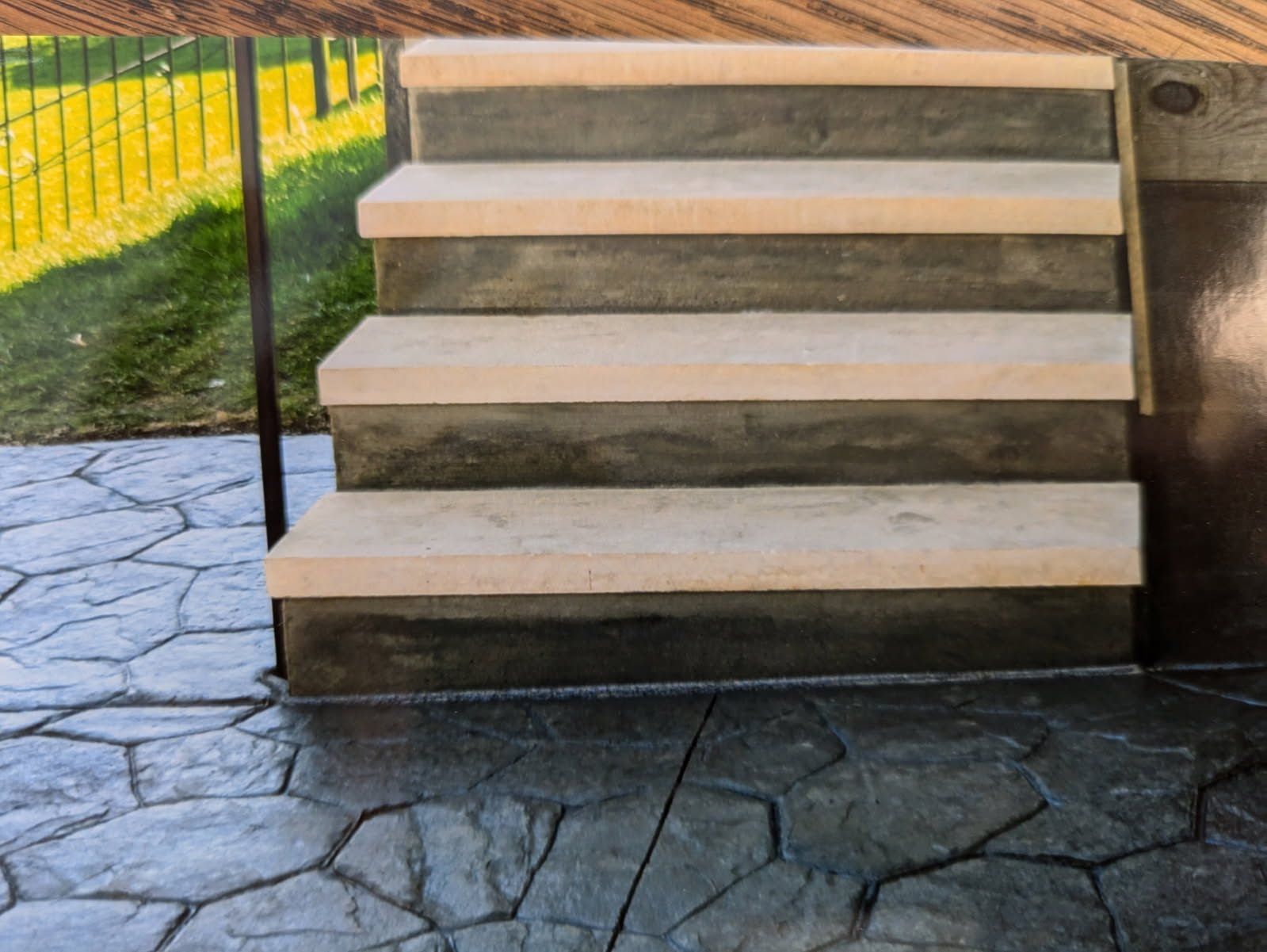 A set of stairs with a fence in the background
