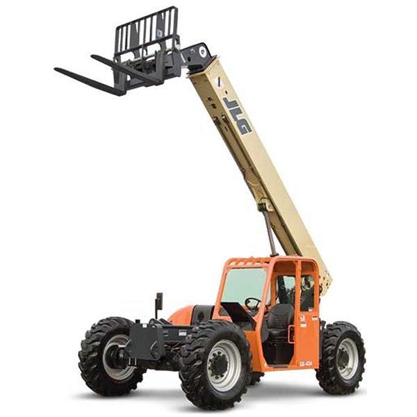 Orange JLG telehandler with raised forks, outdoors.
