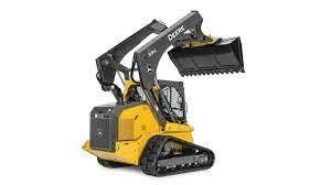 Yellow John Deere compact track loader with bucket raised.