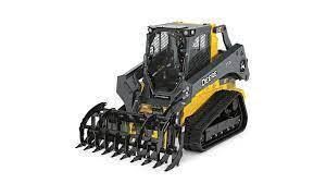 Yellow and black skid steer loader with grapple attachment.