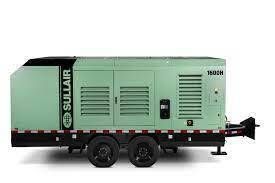Green Sullair air compressor on a trailer, black wheels, against a white background.
