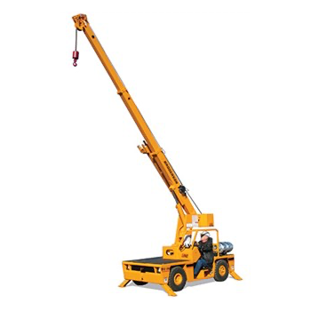 Yellow mobile crane with a person operating it, lifting a hook in a white setting.