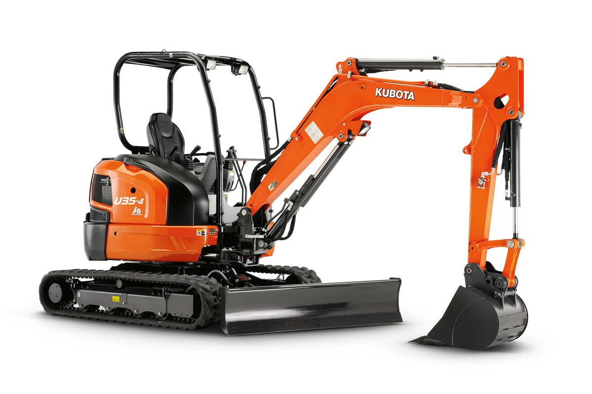 Orange Kubota mini excavator on tracks, digging, outdoors.