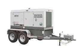 Wacker Neuson generator on a trailer with two wheels, white and gray colors, for construction or emergency power.
