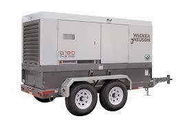 Gray Wacker Neuson generator on a trailer with two tires, outdoors.