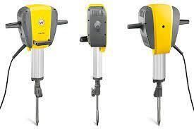 Three views of an electric jackhammer with a yellow and gray body and metal chisel.