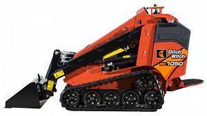 Orange and black Ditch Witch SK1050 mini skid steer with tracks and a front loader bucket.