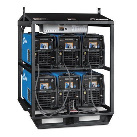 Welding equipment rack with seven blue welding machines.