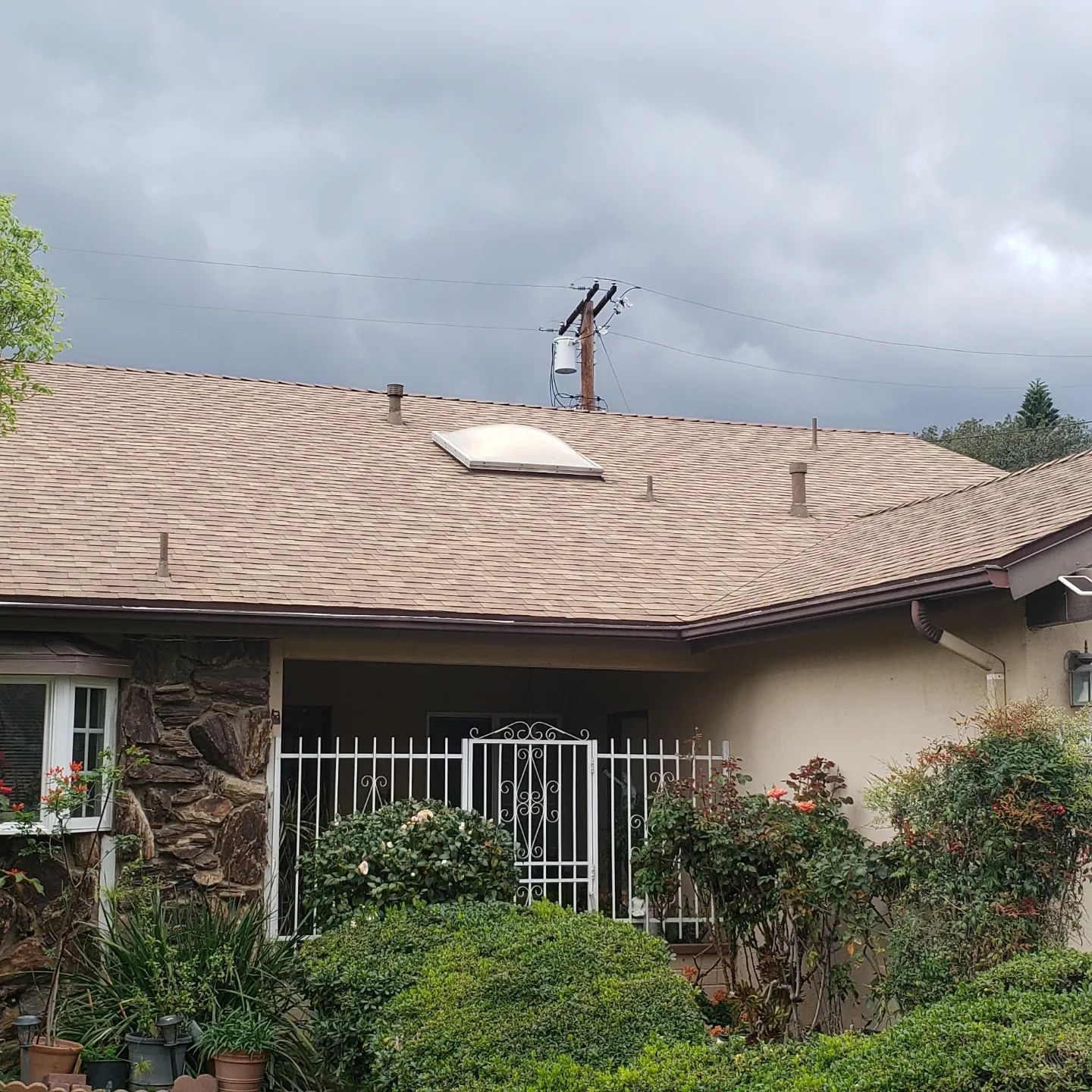 A close up of a roof with a chimney on it