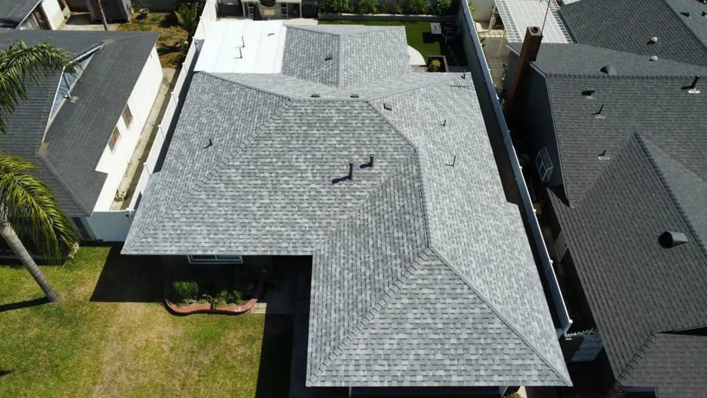 A roof with a cooler on top of it