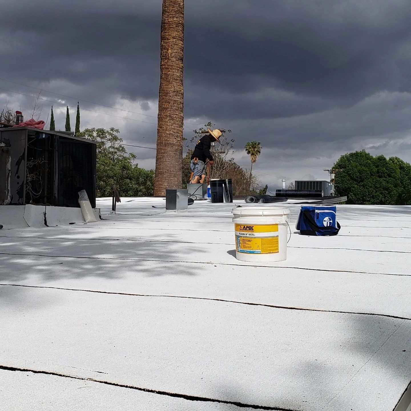 A wooden roof with a yellow cord laying on it