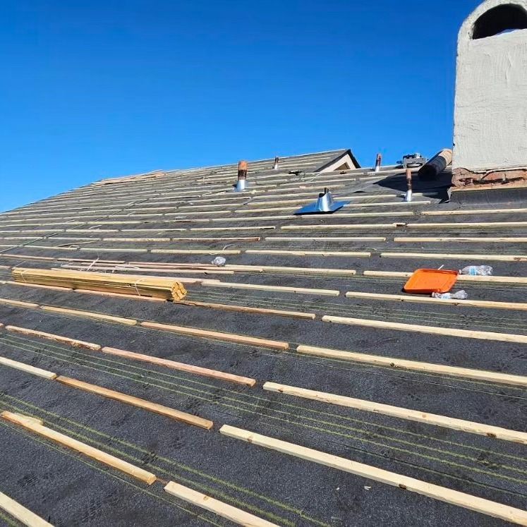 A roof with a bunch of tools on it