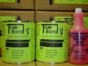 Two neon-green True-Bond glue bottles beside a pink Super-Glue bottle on a shelf.