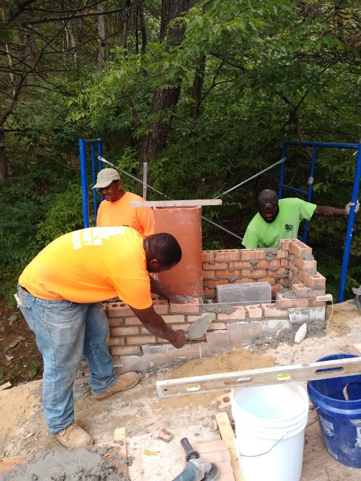 men working on chimney