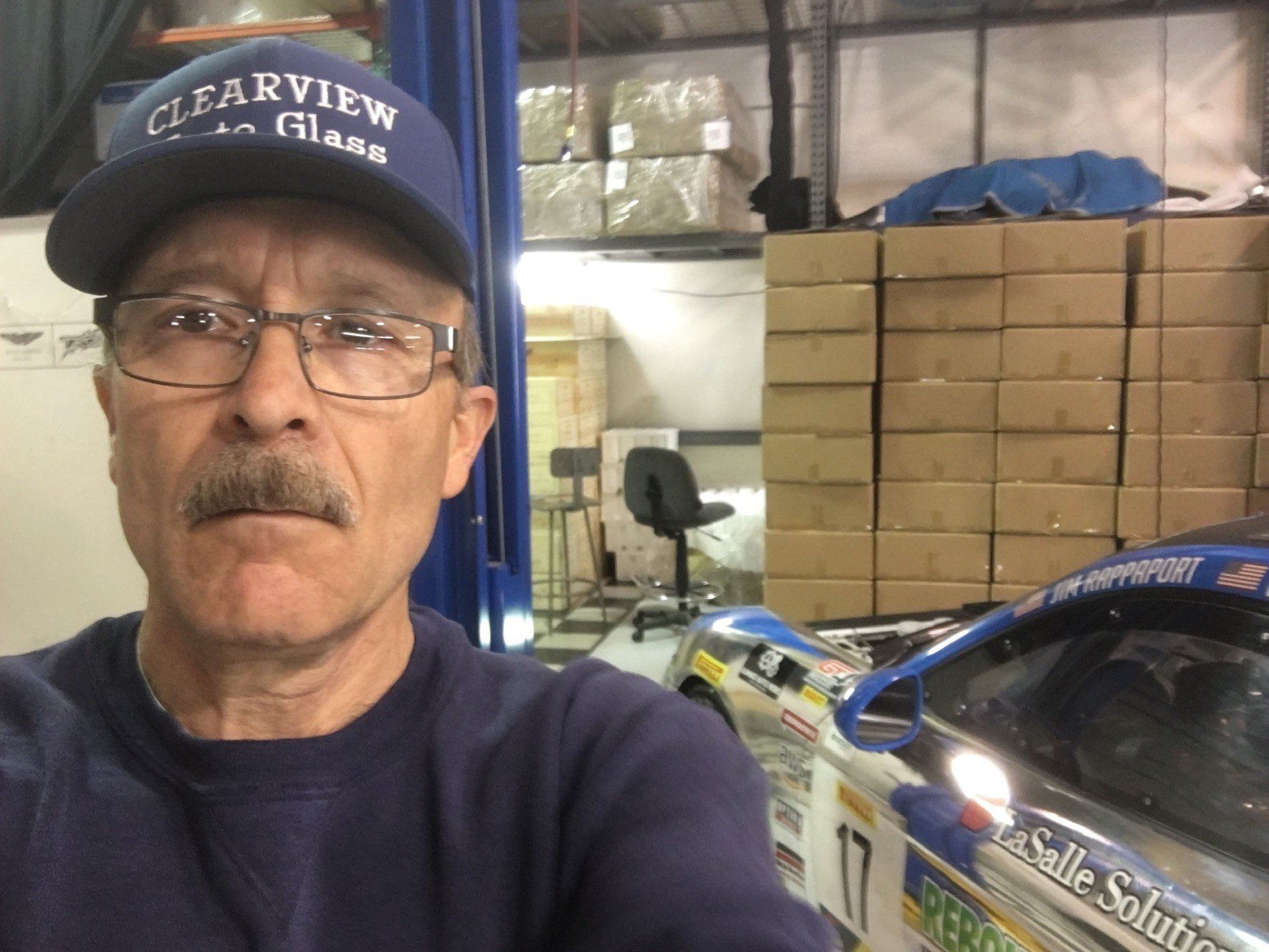 Tech with new windshield
